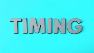 The image shows the word TIMING written in pretty dusty gray letters in the centre of a pretty electric blue coloured background i want the font to look young and be in line with education theme-1