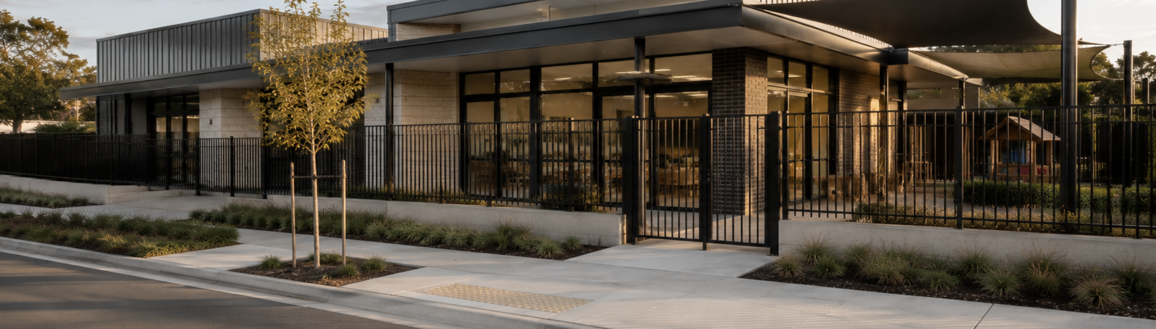 Institutional commercial building with covered entry, restrained materials and energy-conscious window design